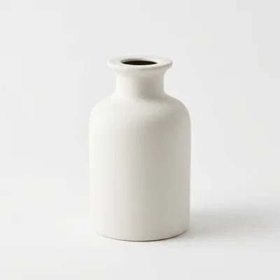 Minimalist White Ceramic Vase On White Background