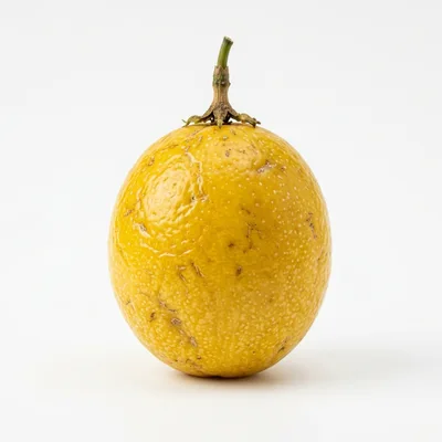 Single Yellow Passion Fruit Isolated On White Background