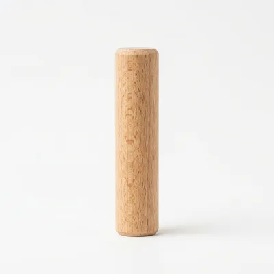 Wooden Cylinder Standing Upright On White Background