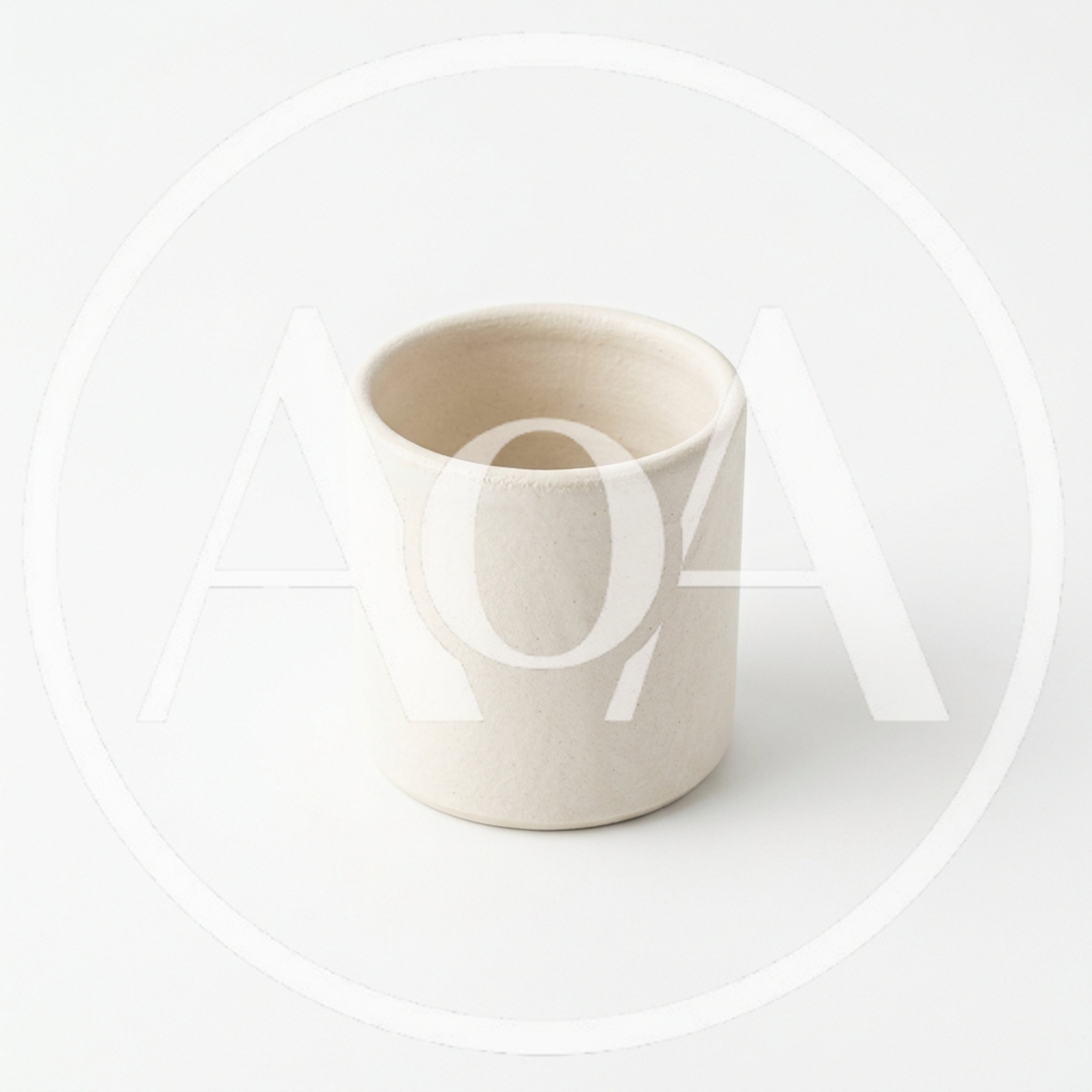 Minimalist Beige Ceramic Cup On White Background