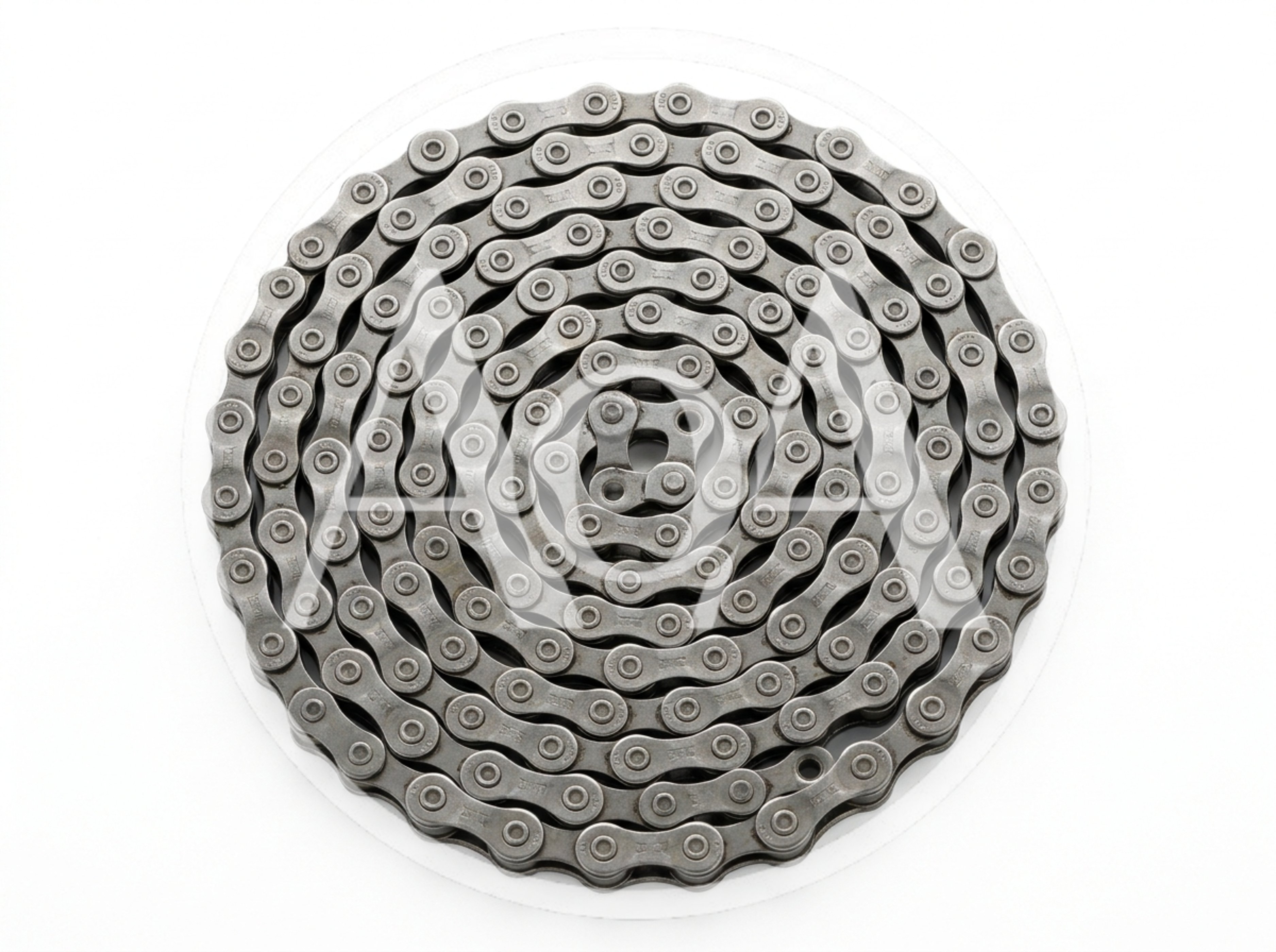 Coiled Metal Bicycle Chain on White Background