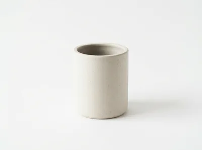 Minimalist Matte Ceramic Cup On White Background