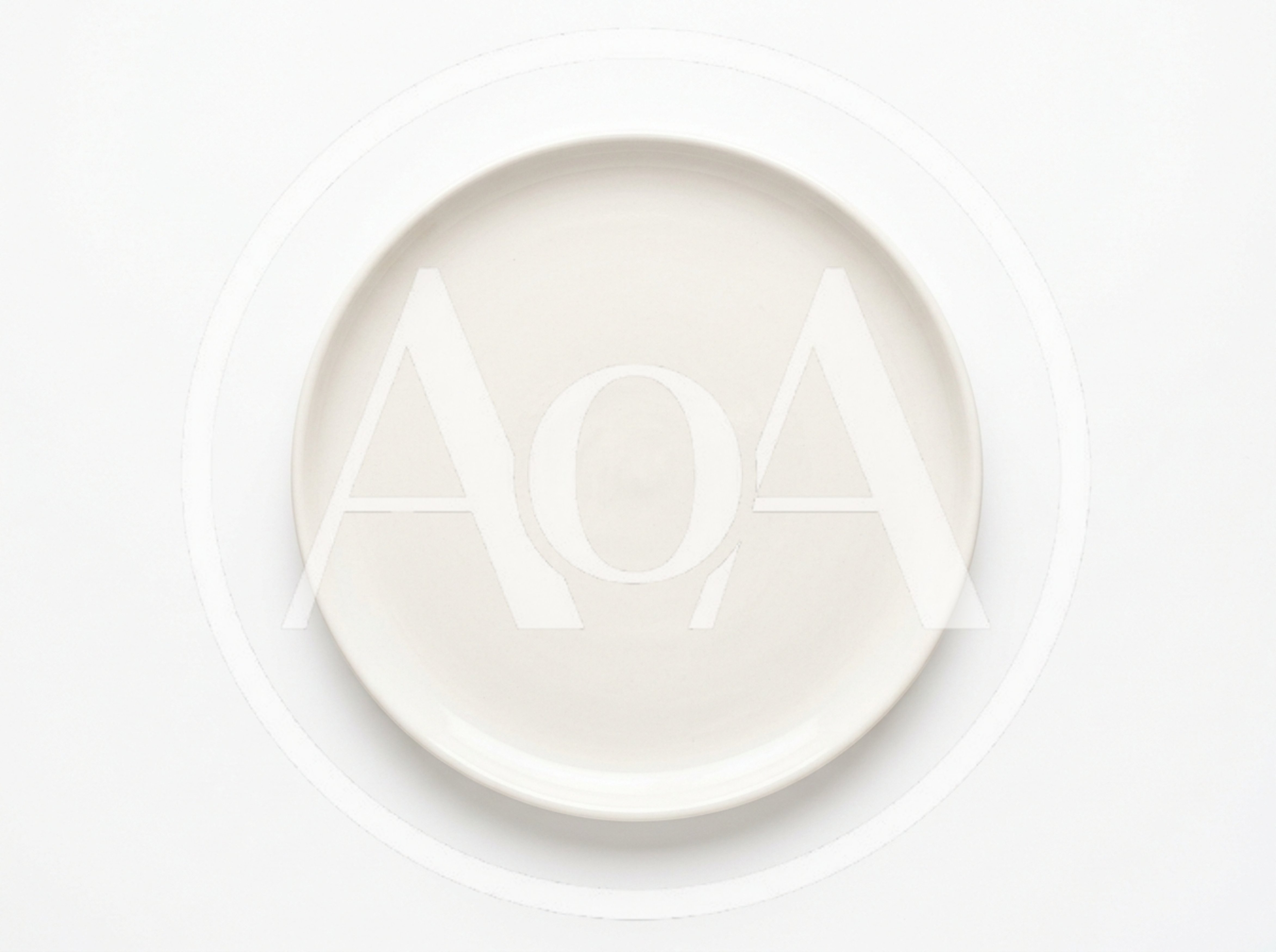 Minimalist White Ceramic Dinner Plate On White Background