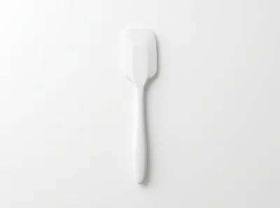 White Silicone Kitchen Spatula On White Background