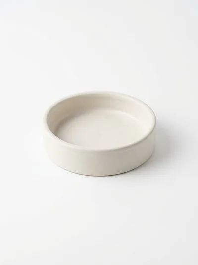 Minimalist Ceramic Bowl On White Background