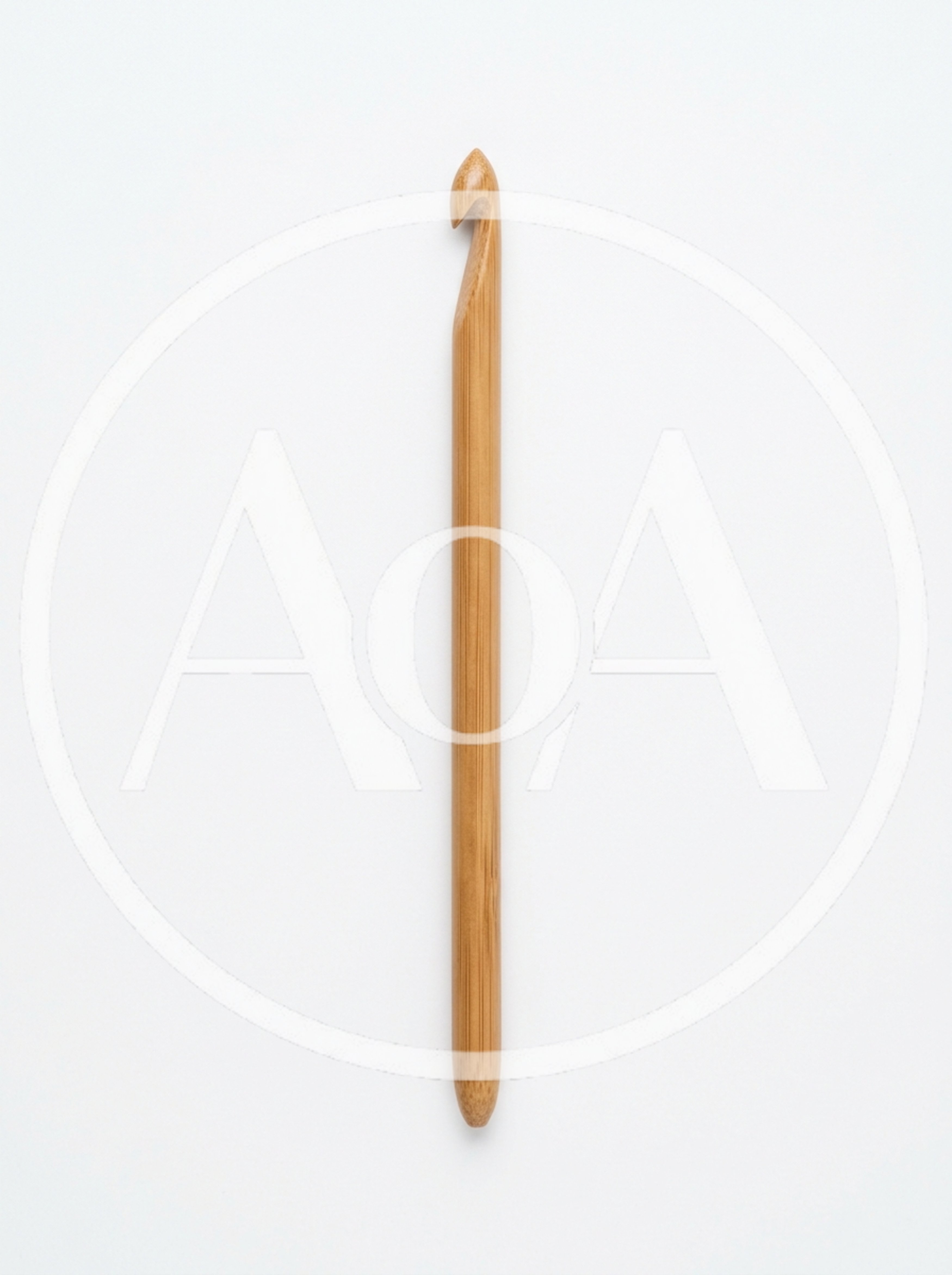 Single Bamboo Crochet Hook On White Background