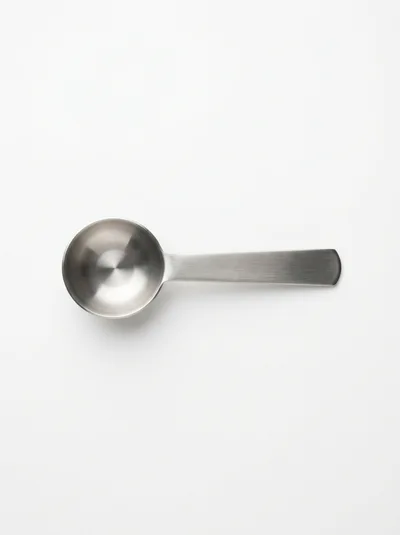 Top Down View Of A Stainless Steel Measuring Spoon