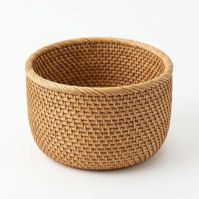 Woven Rattan Storage Basket On White Background