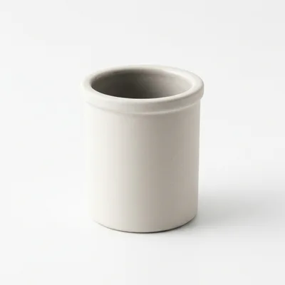 Minimalist Ceramic Utensil Holder On White Background