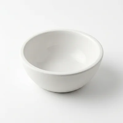 Minimalist White Ceramic Bowl on White Background