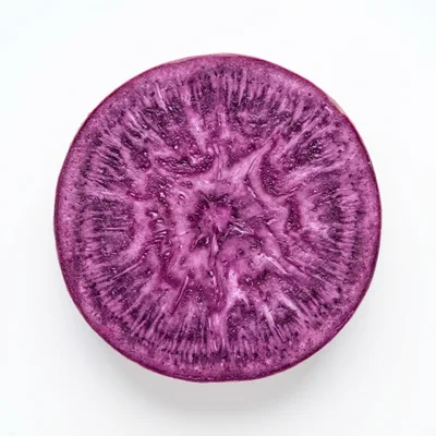 Cross Section Of A Raw Purple Sweet Potato