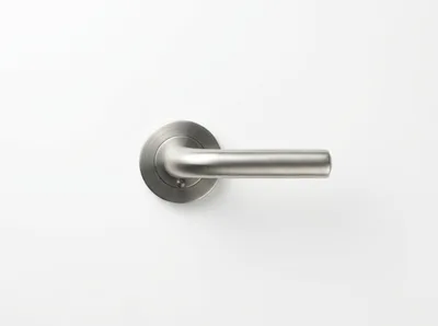 Modern Brushed Metal Door Handle On White Background