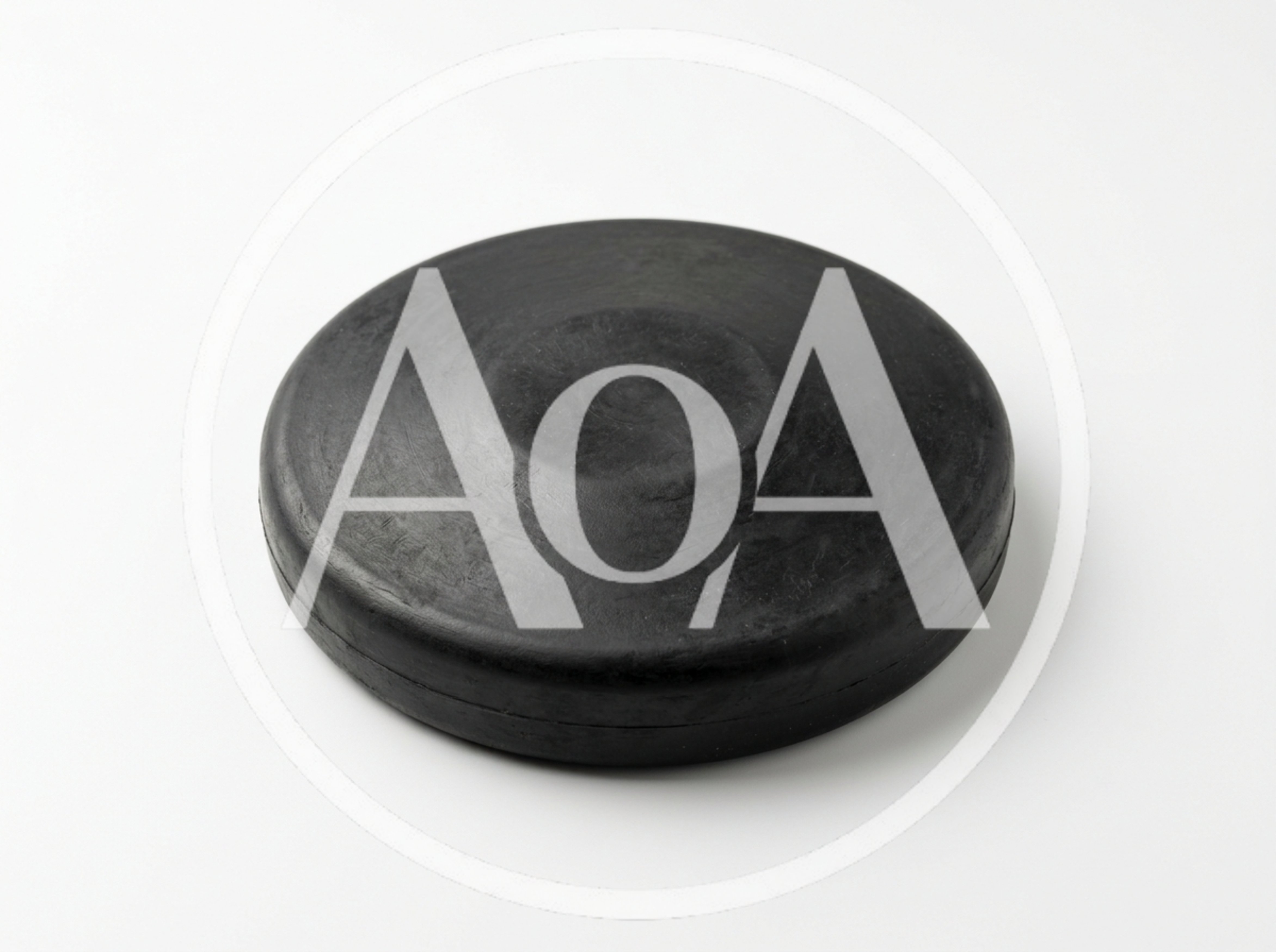 Black Rubber Hockey Puck Isolated On White Background