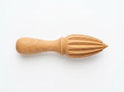Wooden Citrus Reamer On White Background