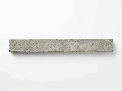 Single Rectangular Concrete Block on White Background