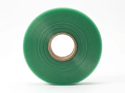 Green Plastic Protective Film Roll On White Background