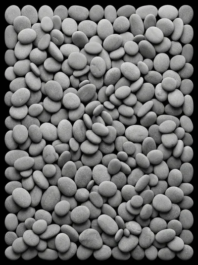 Top Down View Of Smooth Grey River Stones