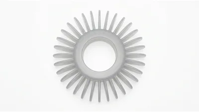 Translucent Silicone Gear Shaped Component On White Background