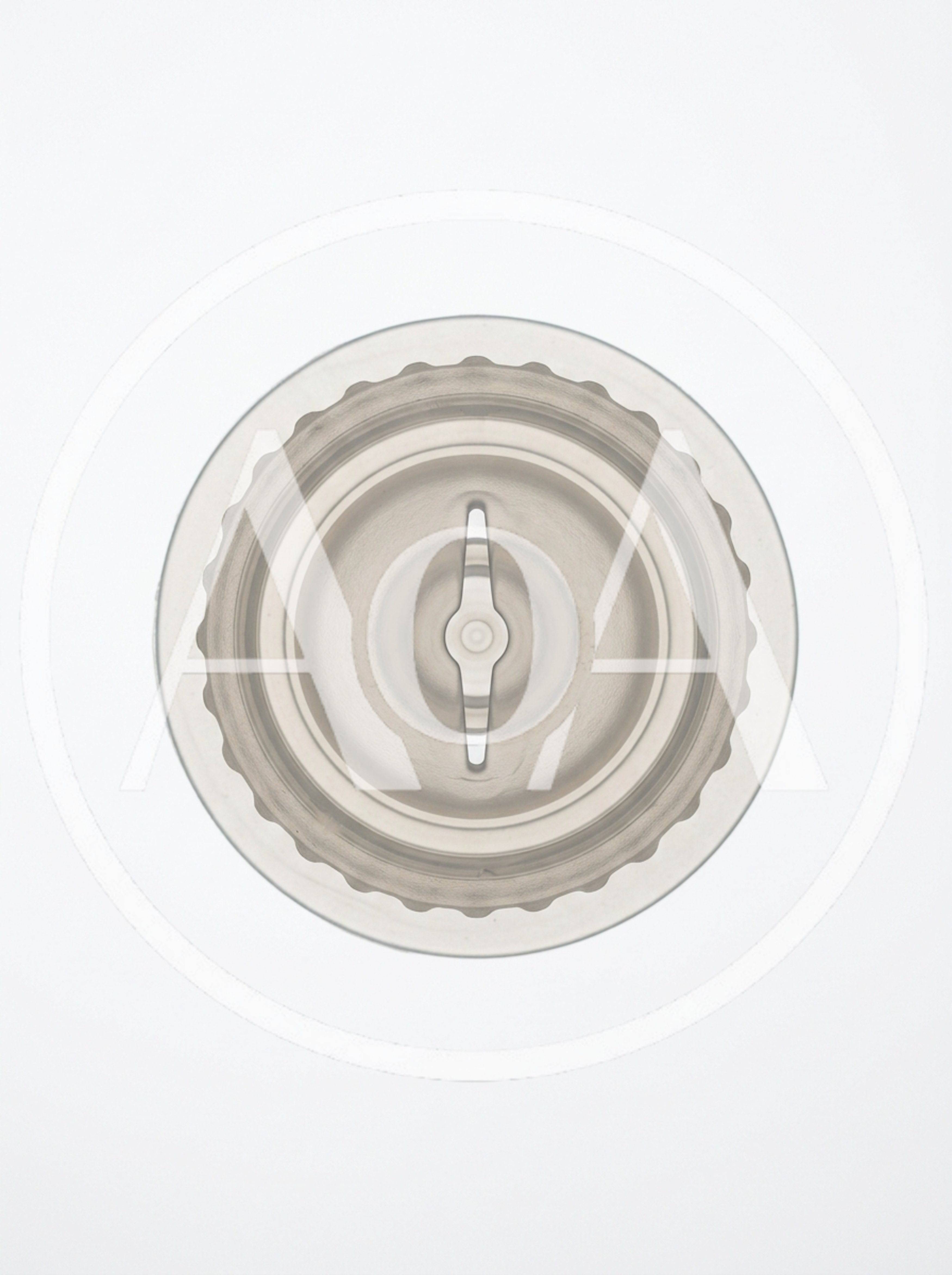 Top Down View Of A Clear Plastic Blender Lid