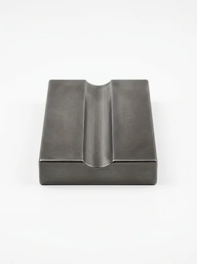 Brushed Metal Cigar Rest On White Background