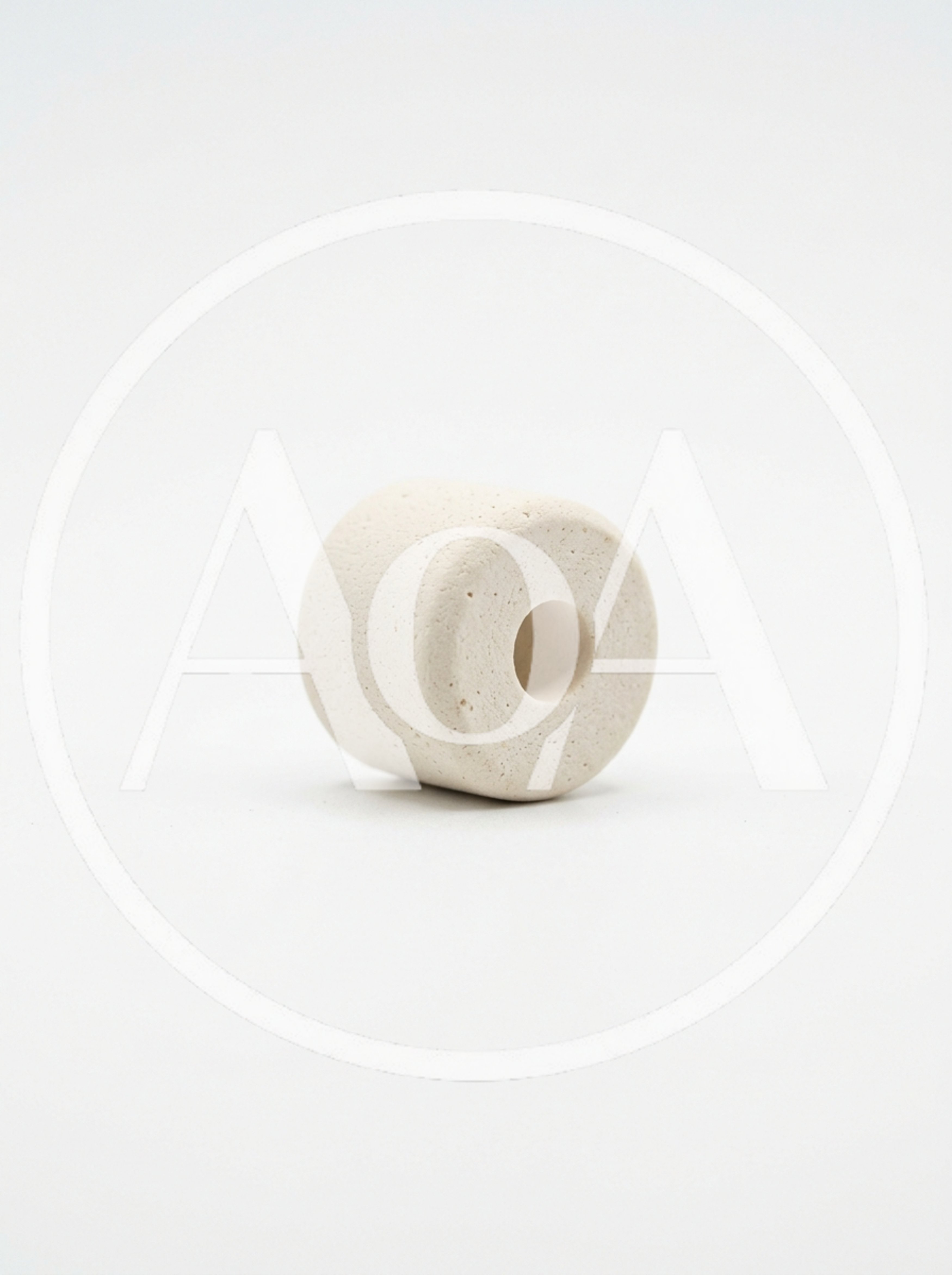 Single White Ceramic Cylinder Bead On White Background