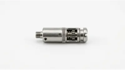 Precision Metal Mechanical Component on White Background