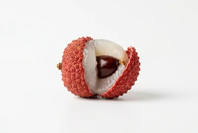 Single Peeled Lychee Fruit on White Background
