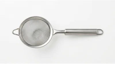 Stainless Steel Kitchen Sieve Isolated On White Background