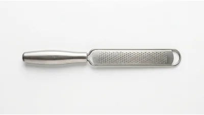 Stainless Steel Kitchen Grater On White Background