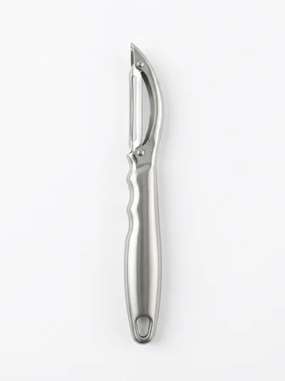 Stainless Steel Vegetable Peeler Isolated On White Background