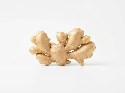Fresh Raw Ginger Root Isolated On White Background