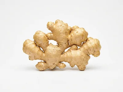 Fresh Raw Ginger Root Isolated On White Background
