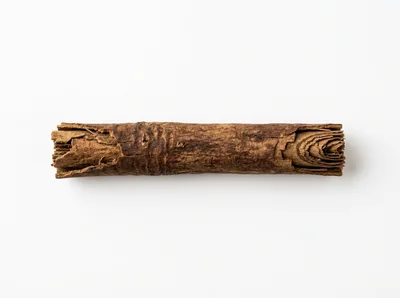 Single Cinnamon Stick Isolated On White Background