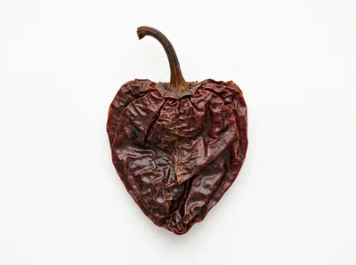 Dried Ancho Chili Pepper Isolated On White Background