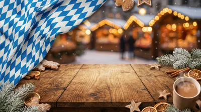 Wooden Table With Christmas Market Background And Bavarian Flag