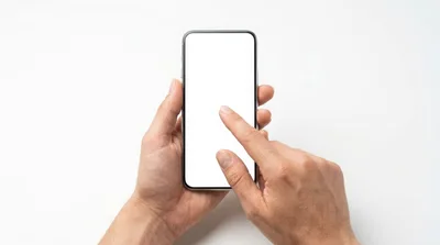 Person Holding Smartphone With Blank White Screen