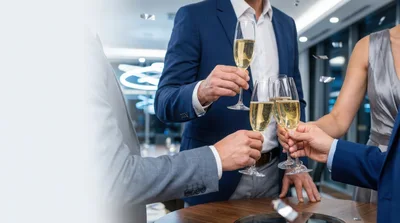 Business Professionals Toasting With Champagne Glasses At Event