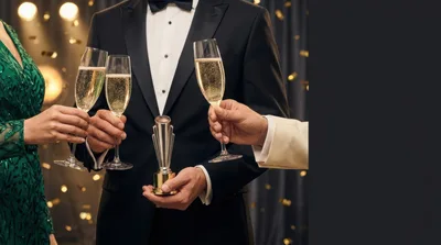 People Toasting With Champagne At An Awards Ceremony