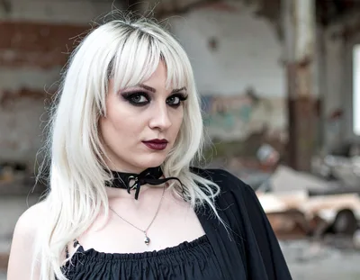 Gothic Woman With Blonde Hair In Abandoned Building