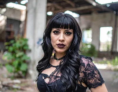 Gothic Woman Posing In Abandoned Industrial Building