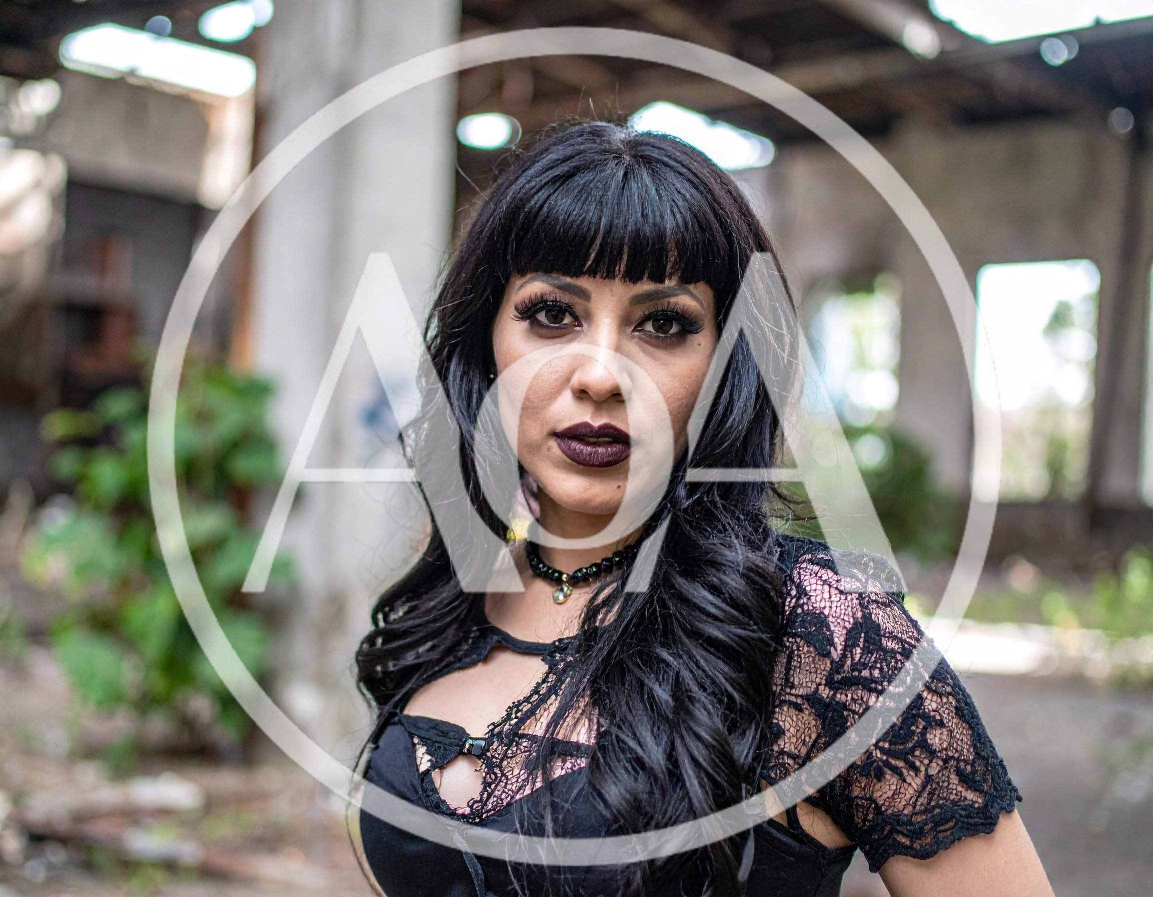 Gothic Woman Posing In Abandoned Industrial Building