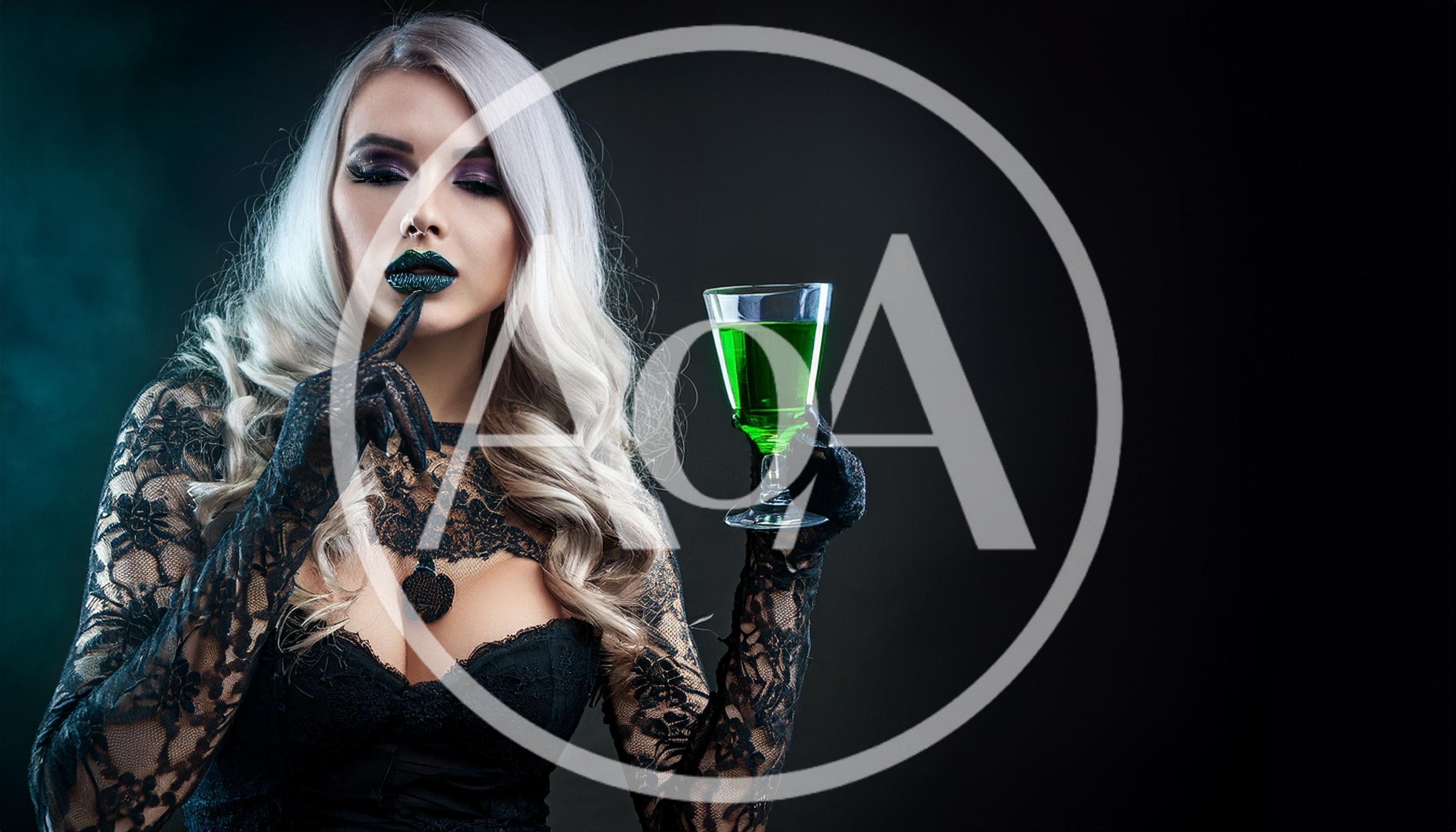 Gothic Woman Holding A Glass Of Green Potion