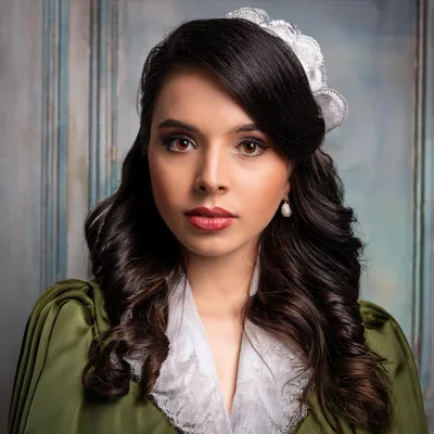 Portrait Of A Young Woman In Victorian Style Clothing