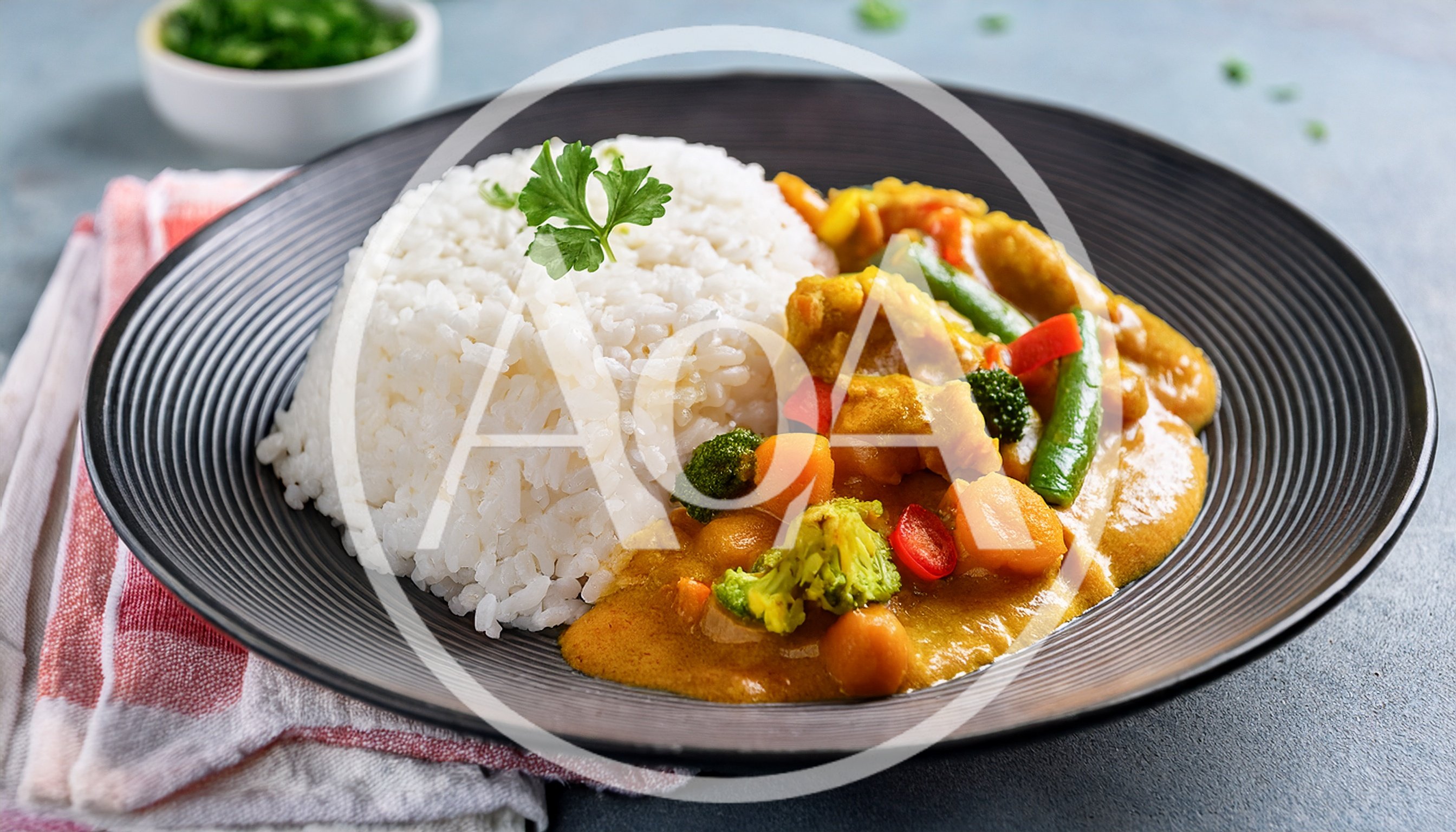 Plate Of Vegetable Curry With Steamed White Rice