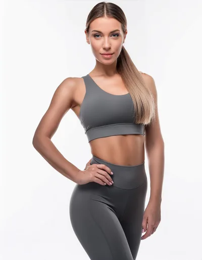 Fit Woman Posing in Grey Athletic Wear