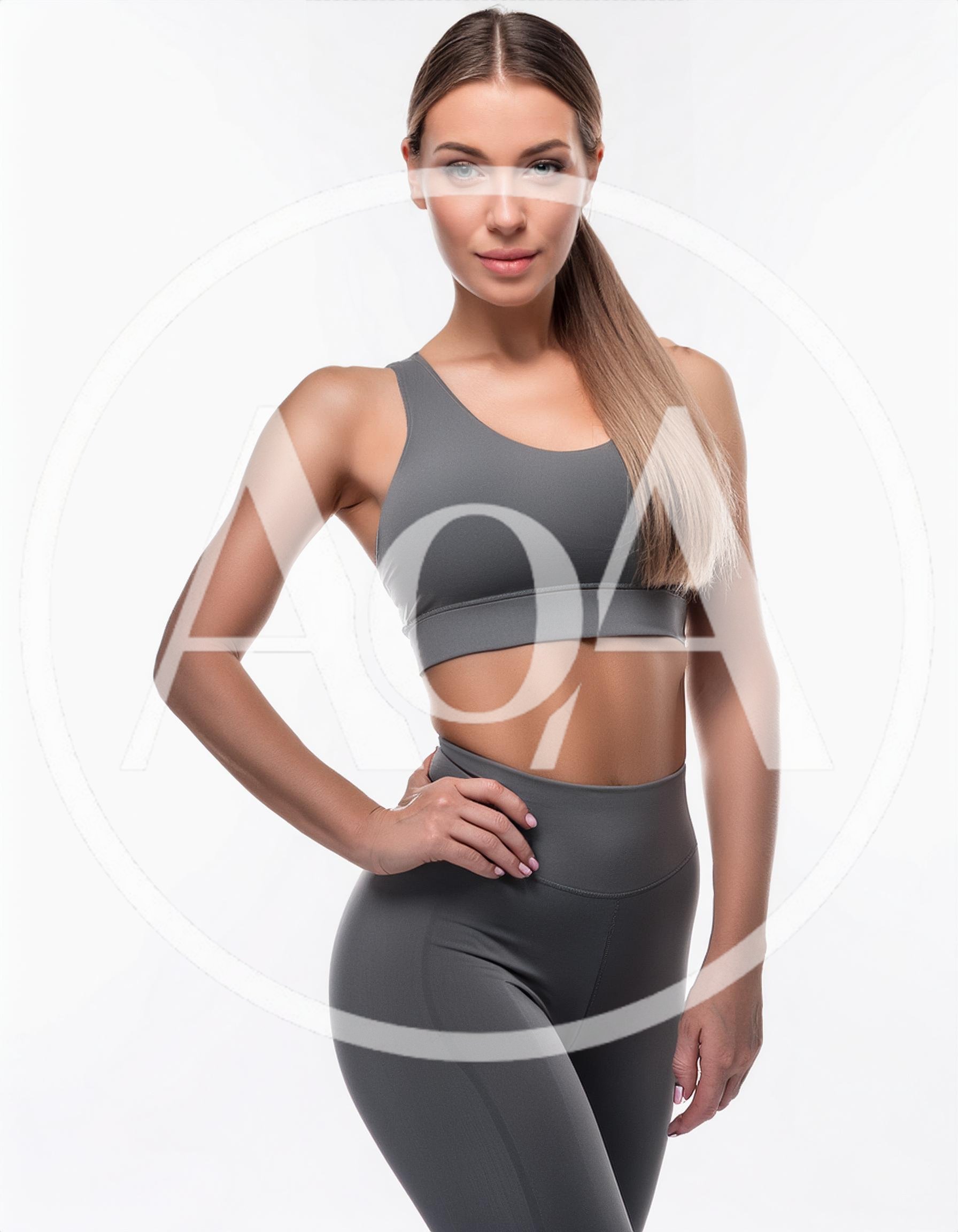Fit Woman Posing in Grey Athletic Wear