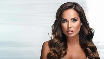 Portrait Of A Beautiful Woman With Wavy Brown Hair
