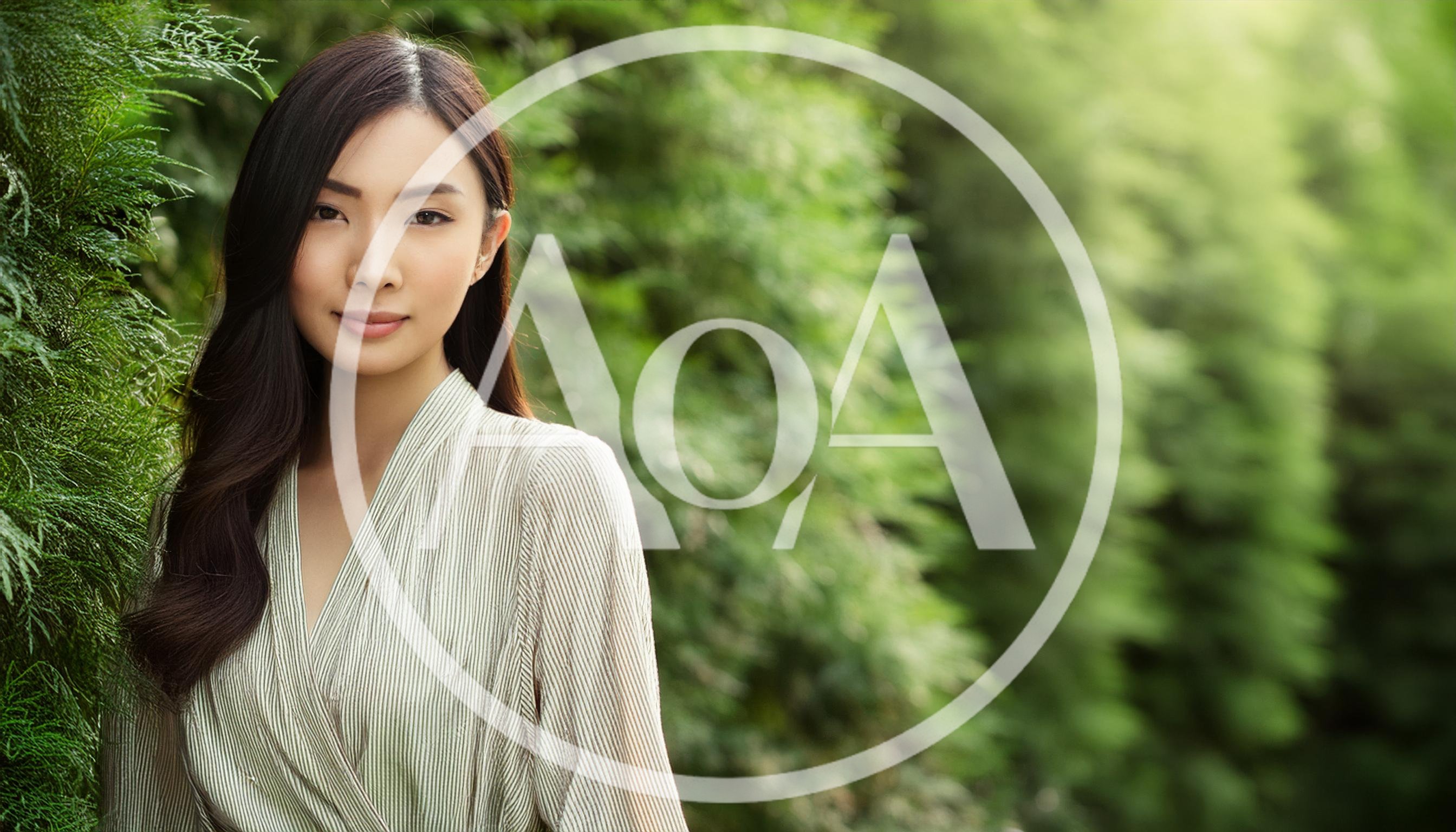 Portrait Of A Young Asian Woman In Nature