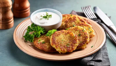 Crispy Potato Pancakes Served With Sour Cream