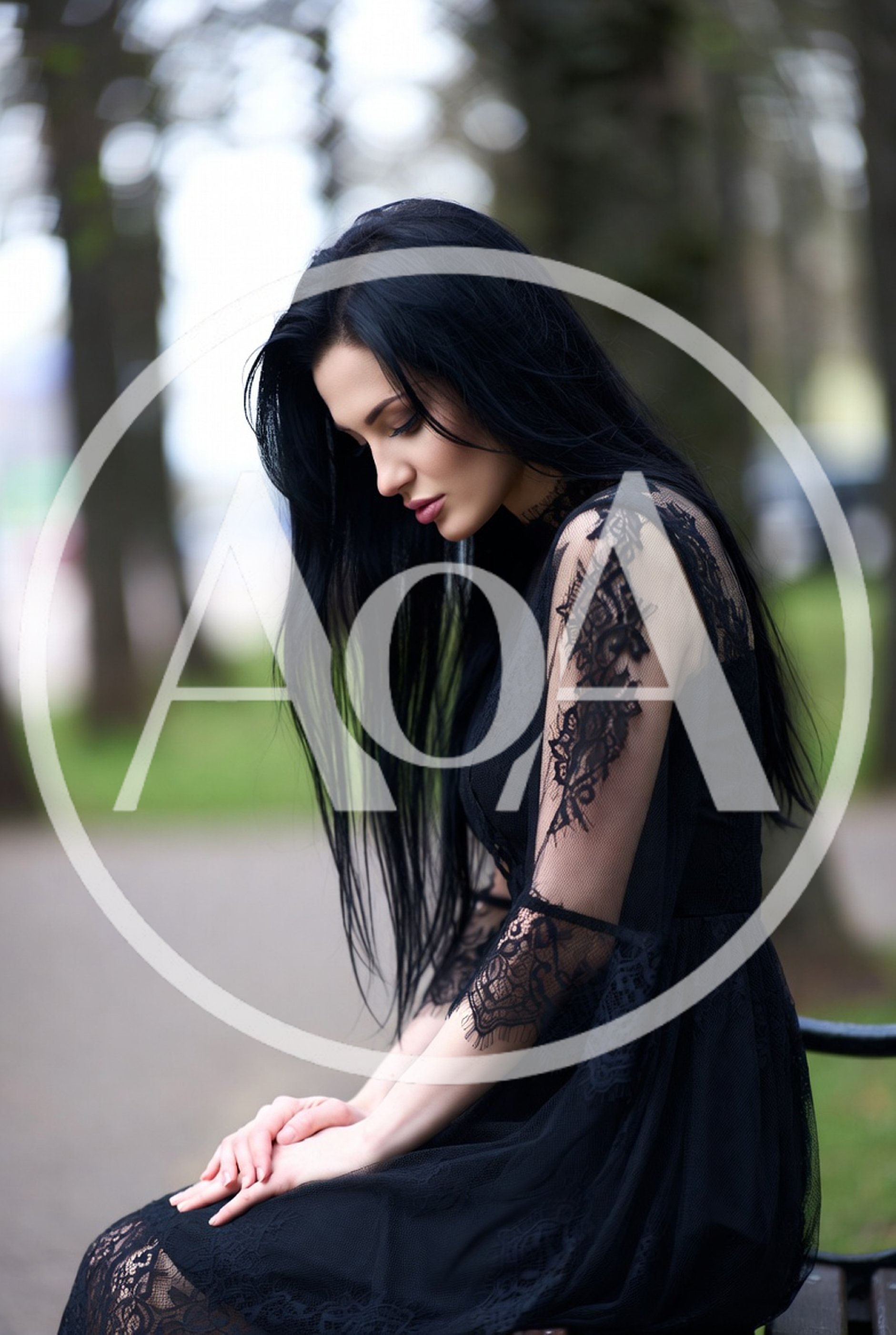 Pensive Woman With Long Black Hair In Lace Dress